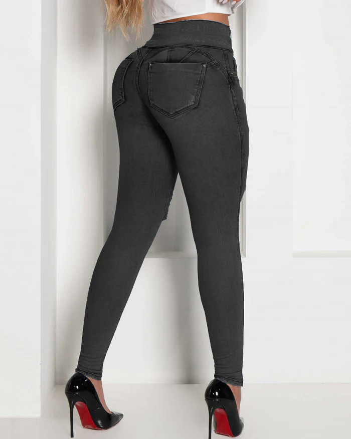 Jeans ajustados rotos de cintura alta