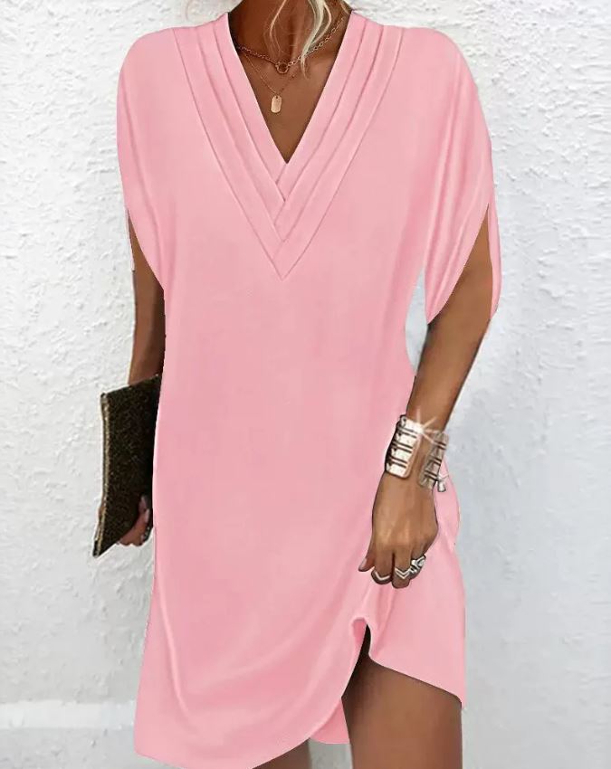 Elegante vestido liso con mangas con aberturas