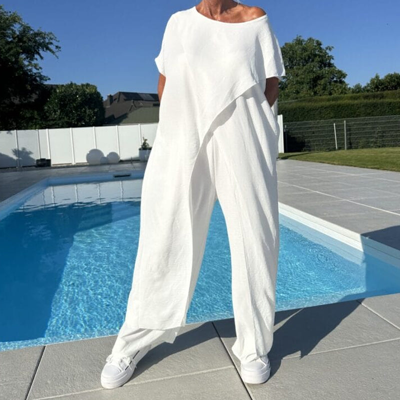 Conjunto de top y pantalón con hombros descubiertos en color liso