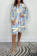 Vestido holgado con estampado de borlas