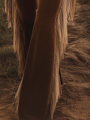 Vaqueros con flecos estilo western vintage