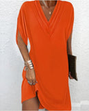 Elegante vestido liso con mangas con aberturas