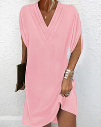 Elegante vestido liso con mangas con aberturas