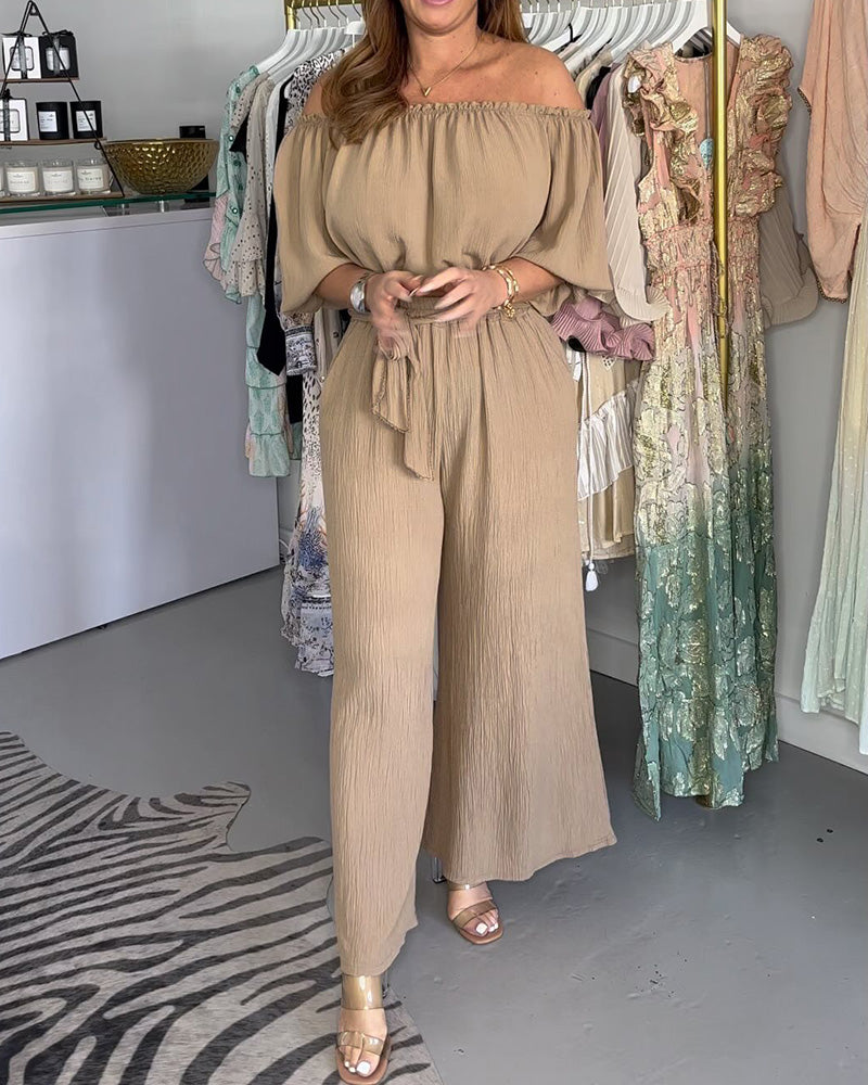 Top sin tirantes + pantalones de pierna ancha