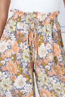 Pantalones Avianna - Pantalones anchos de cintura alta con estampado floral y diseño paper bag