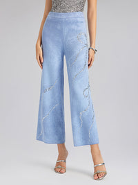 Pantalones elásticos de lana con pedrería