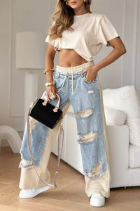 Pantalón con costuras y diseño roto