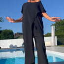 Conjunto de top y pantalón con hombros descubiertos en color liso