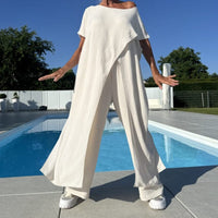 Conjunto de top y pantalón con hombros descubiertos en color liso